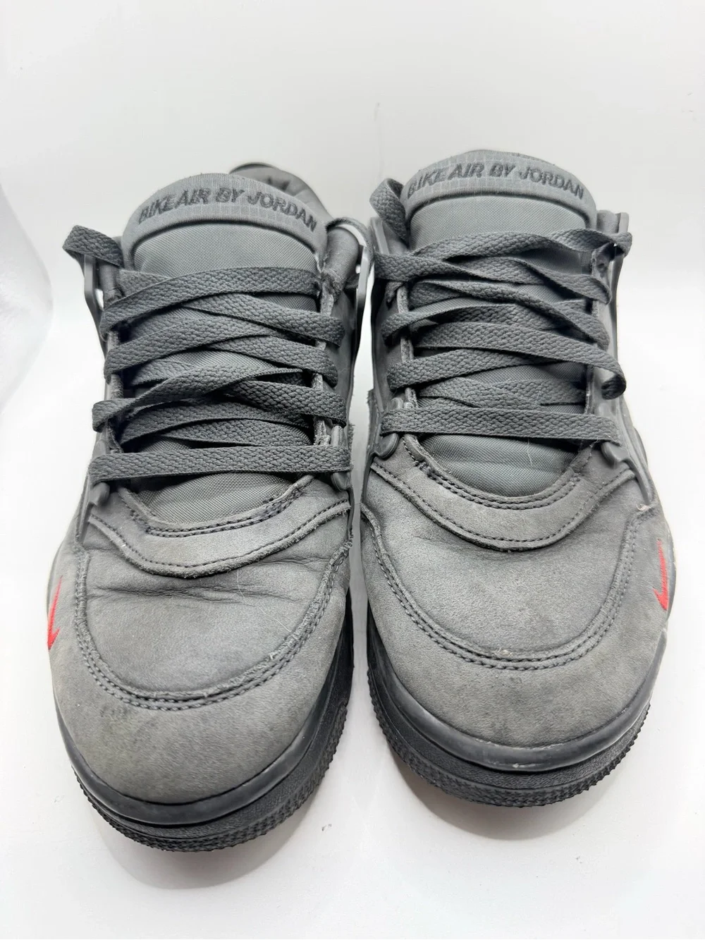Jordan Kids Gray Sneakers with Red Swoosh
